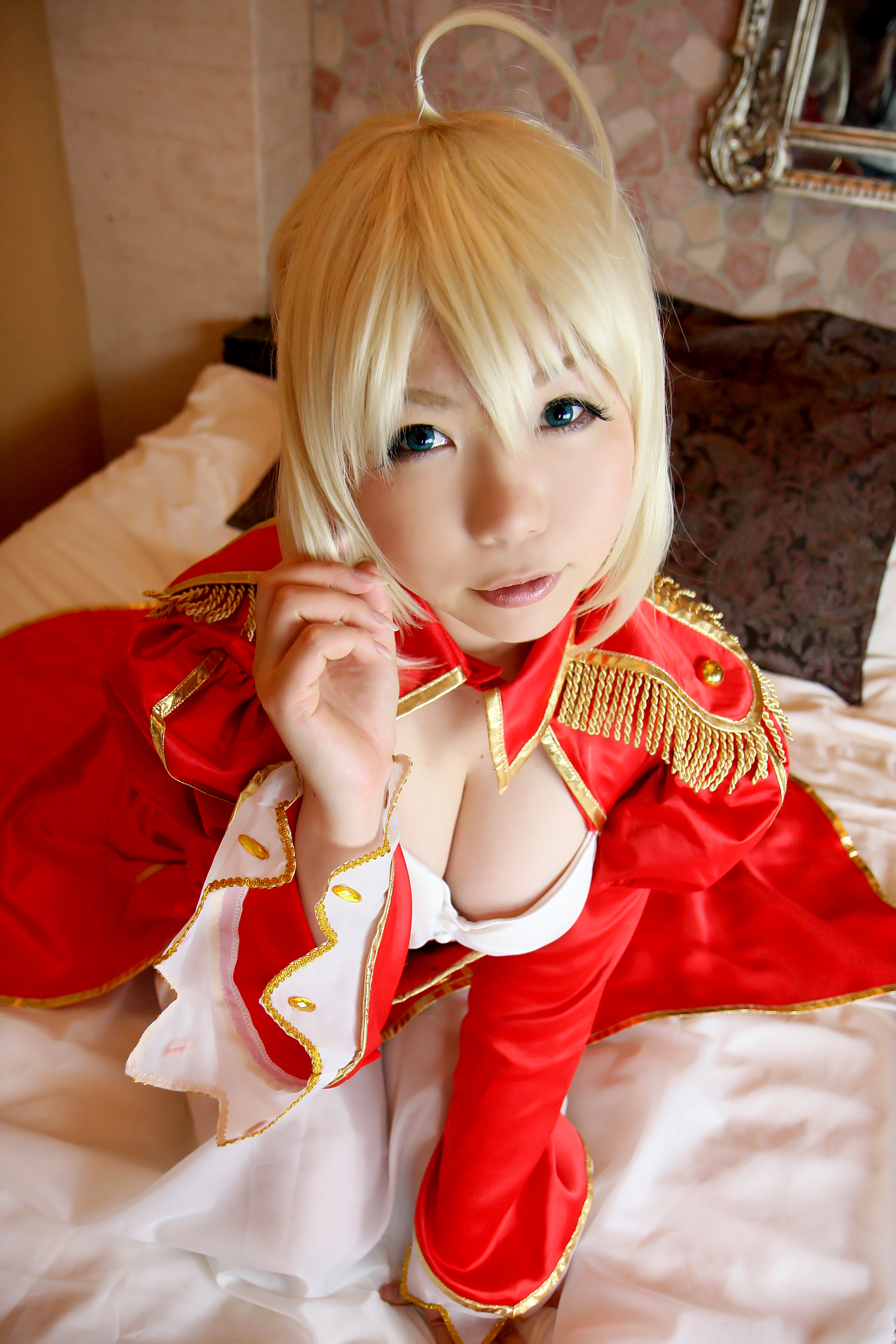 asian bed blonde_hair boots breasts cleavage cosplay dress female high_heels long_hair solo