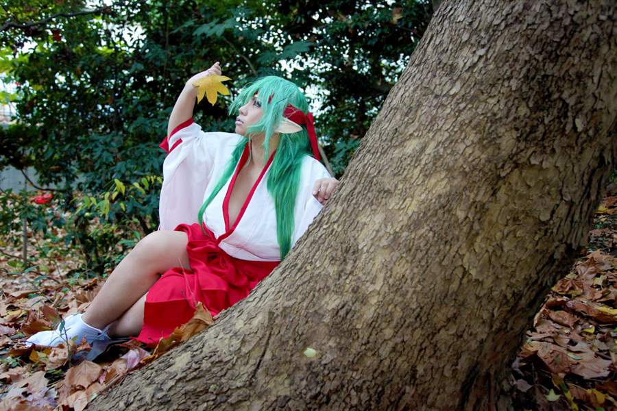 asian breasts chouzuki_maryou cleavage cosplay female green_hair headband huge_breasts long_hair solo