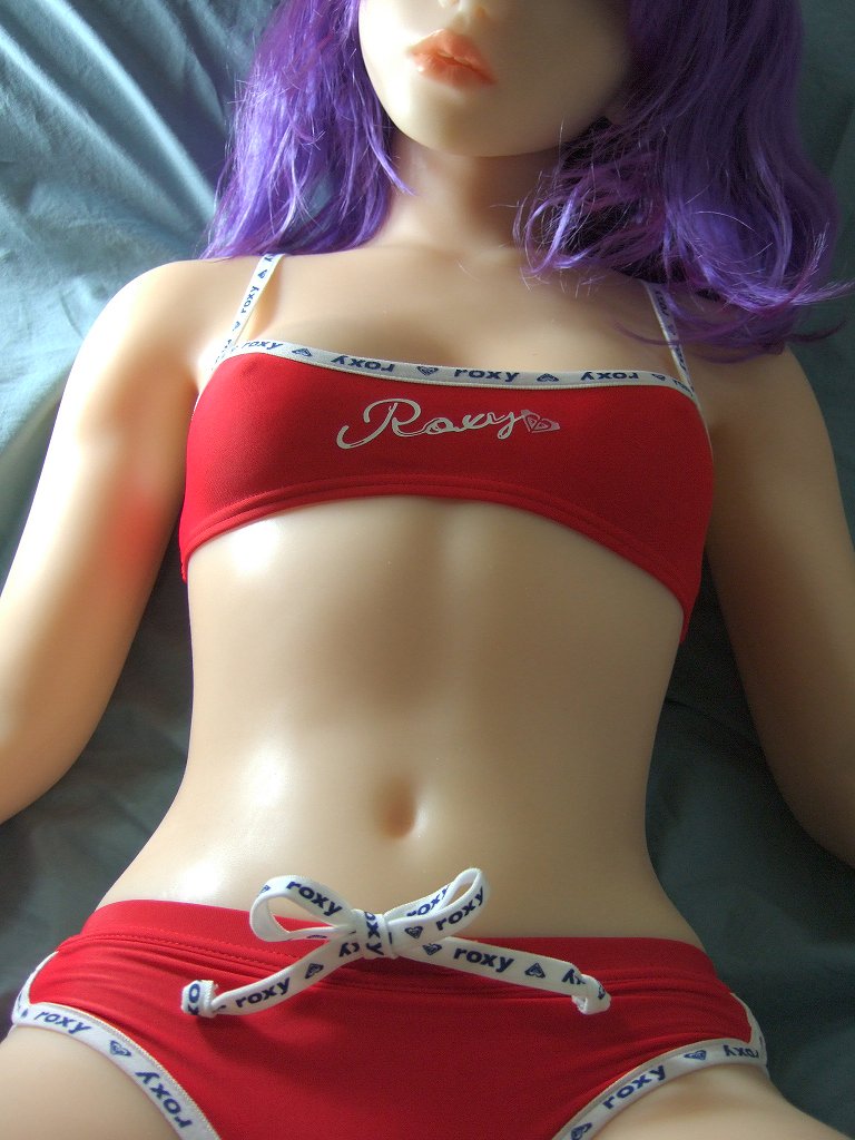 bed bra breasts long_hair lying midriff navel panties purple_hair sex_doll small_breasts solo
