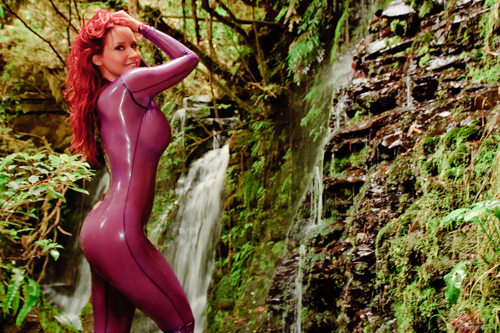 bianca_beauchamp breasts female large_breasts latex long_hair outside red_hair solo watermark