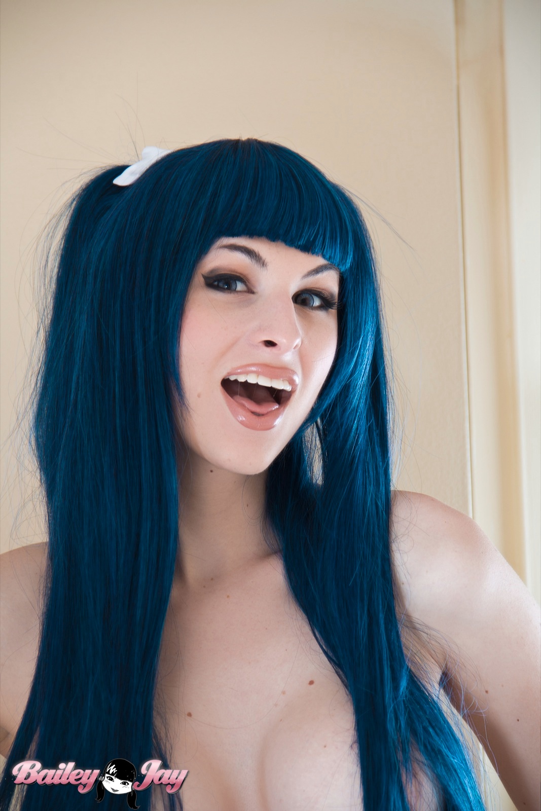 bailey_jay bathroom blue_hair breasts large_breasts long_hair mirror navel shemale solo tattoo watermark