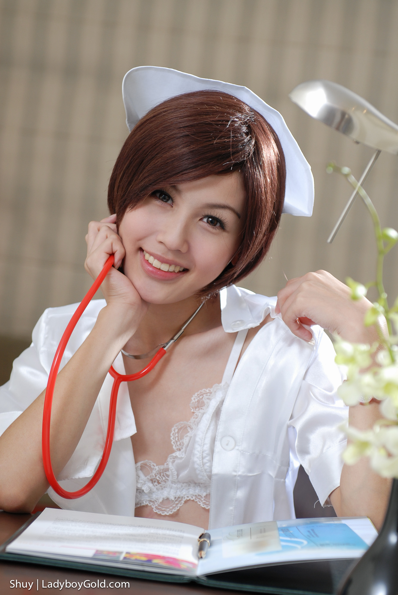 asian breasts brown_hair nurse shemale short_hair solo underwear watermark