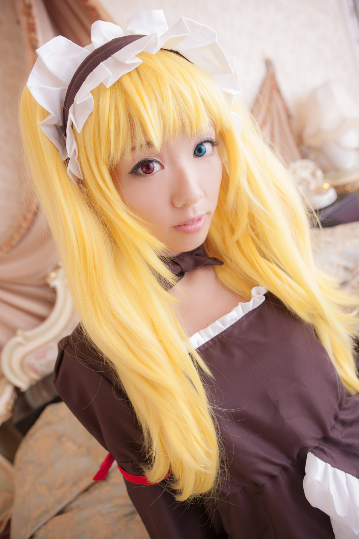 asian blonde_hair breasts cosplay dress female high_heels large_breasts long_hair shoes solo thighhighs twintails