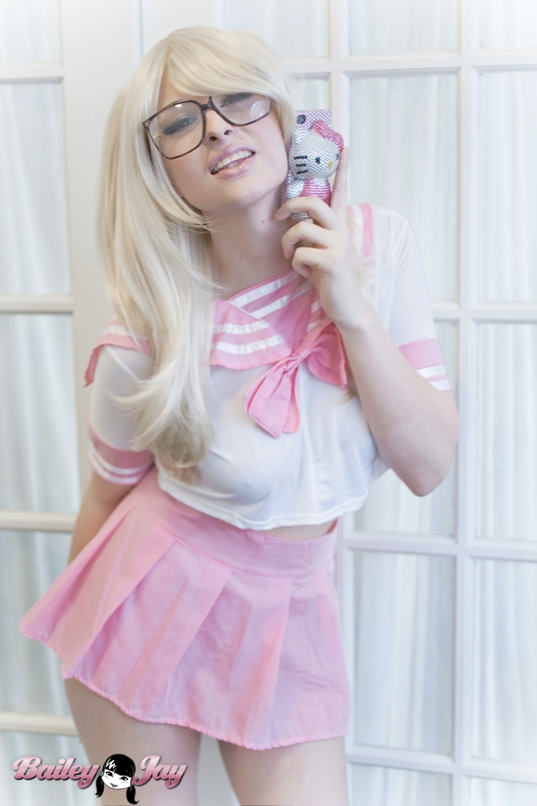 bailey_jay blonde_hair breasts glasses large_breasts long_hair shemale solo watermark