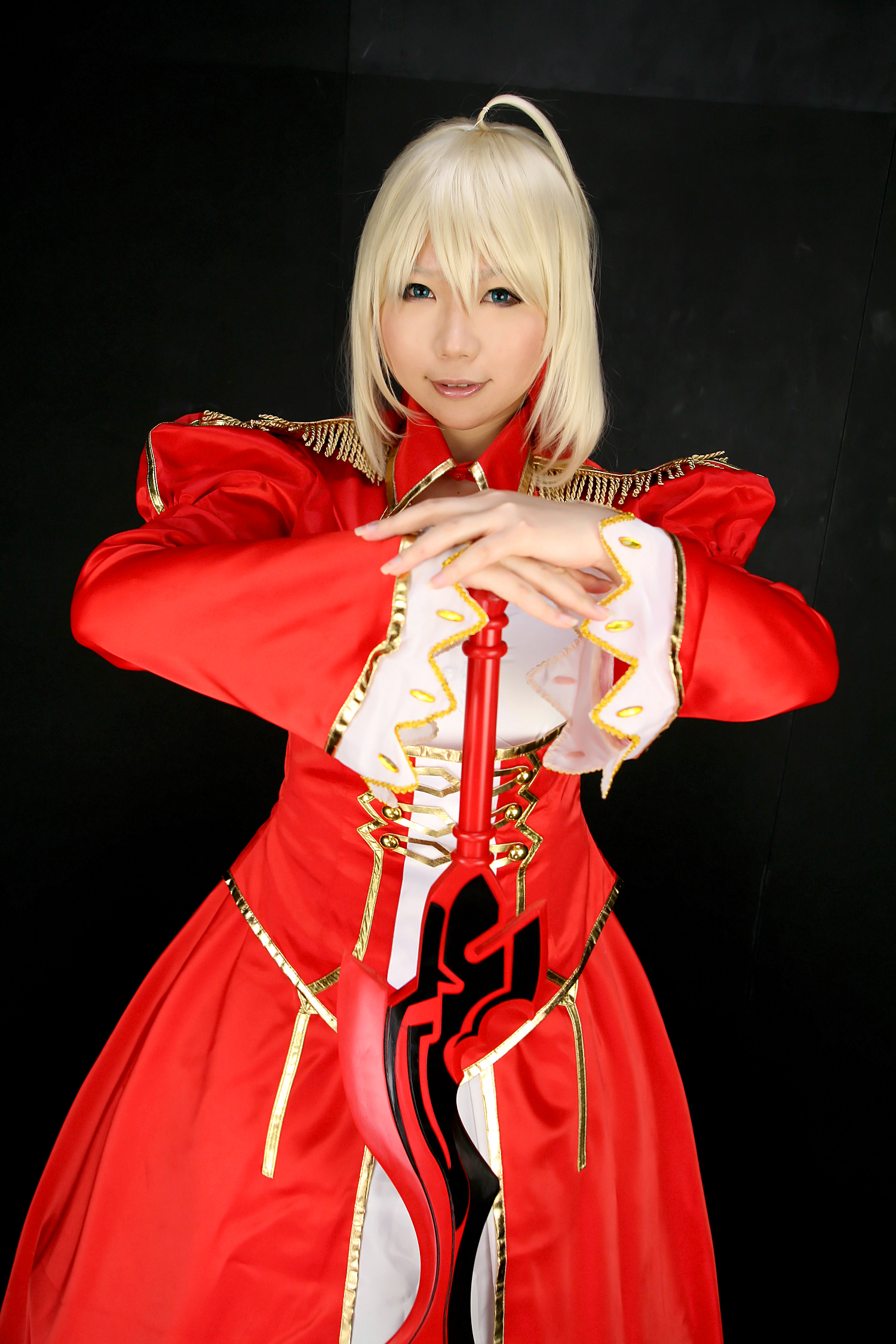 asian blonde_hair boots breasts cosplay dress female high_heels long_hair solo sword