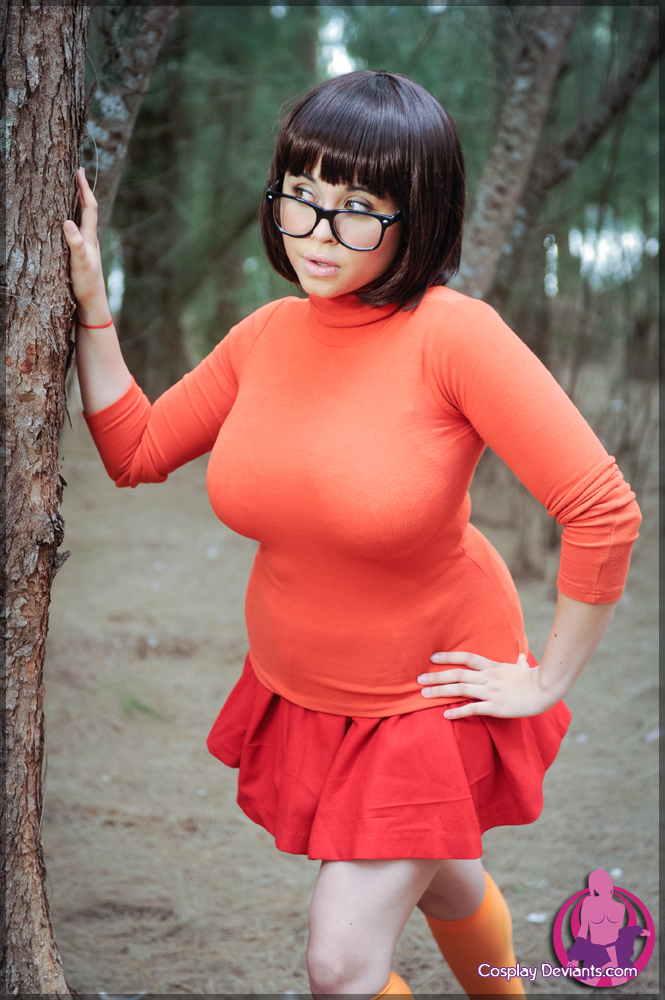 breasts brown_hair cosplay female glasses large_breasts long_hair outside solo watermark