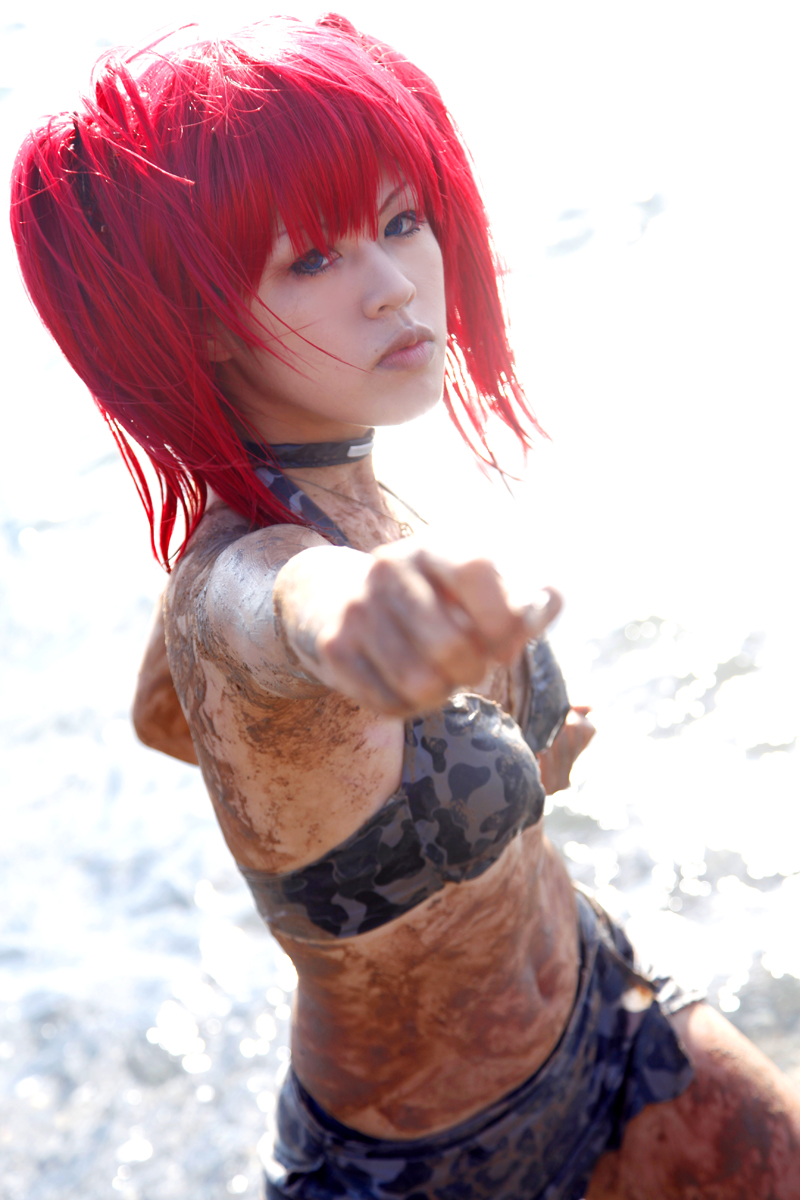 beach bra breasts camouflage_print choker female long_hair midriff mud necklace outside pigtails red_hair skirt small_breasts solo water
