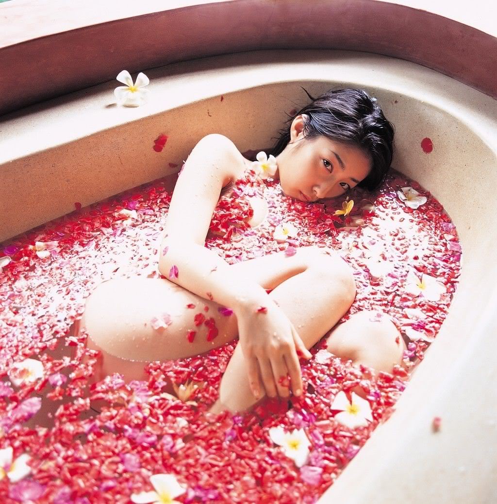 bath bathtub black_hair female flower hiroko_sato japanese long_hair lying nude petals thighs water wet