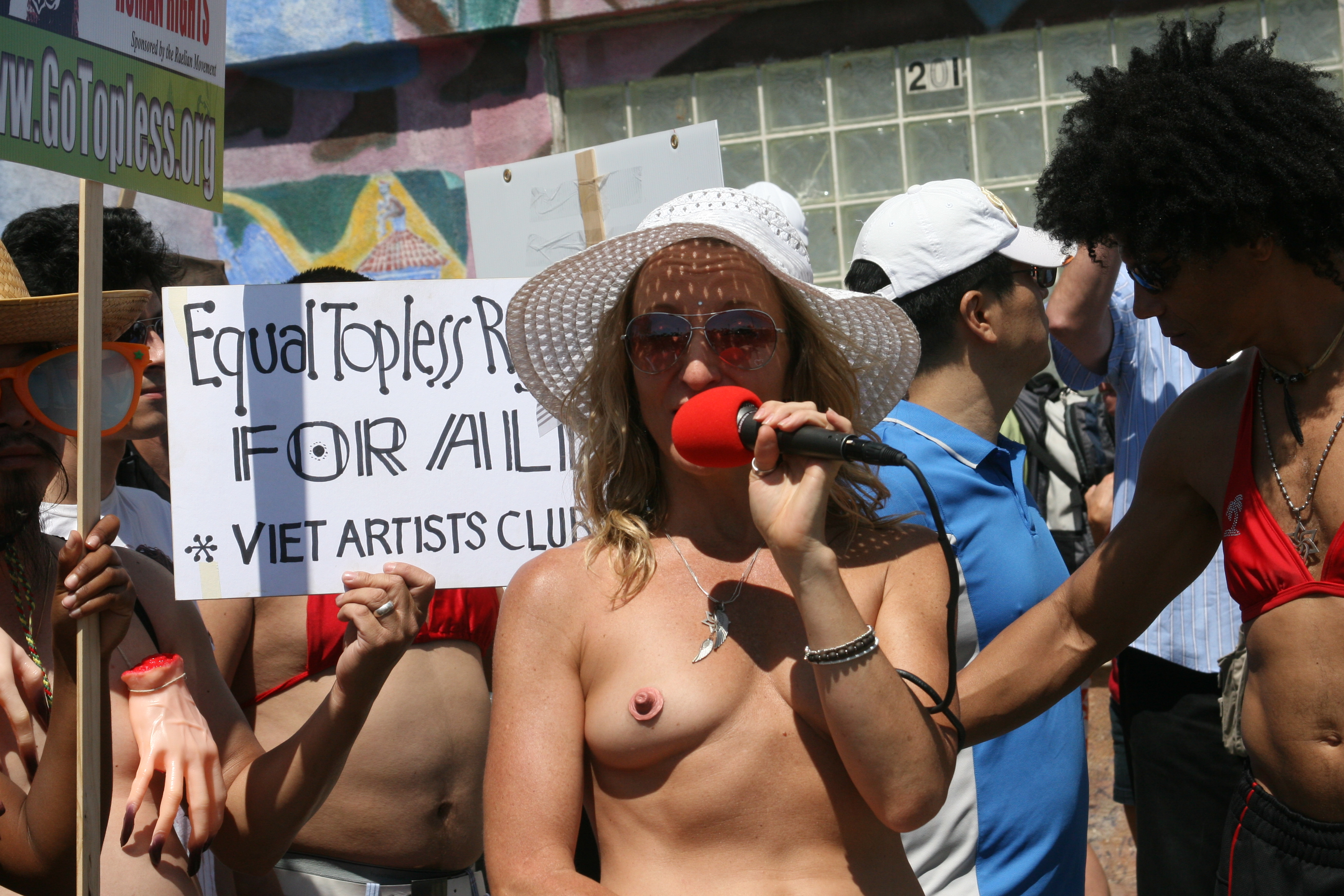 2011 california female holding_microphone los_angeles microphone pasties pink_pasties technology topless topless_protests topless_woman_with_microphone venice_beach_county_park