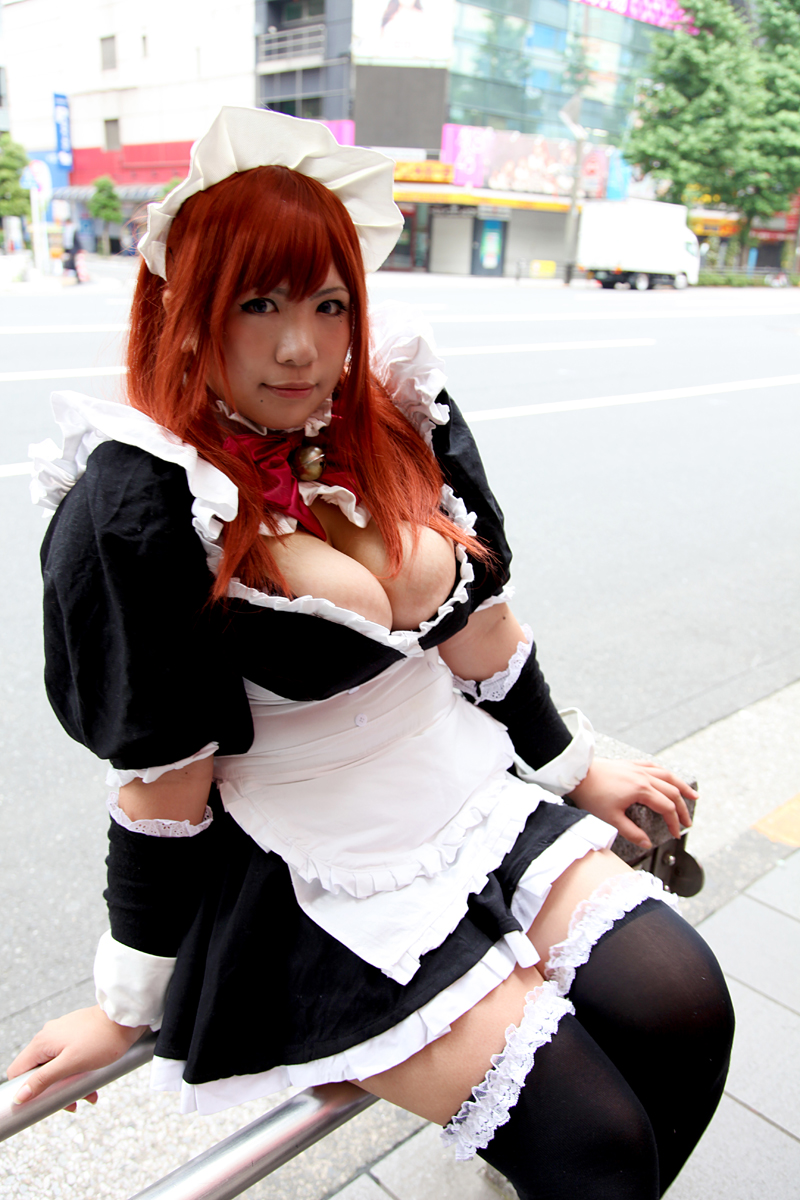 breasts chouzuki_maryou cleavage cosplay large_breasts sitting solo thighhighs