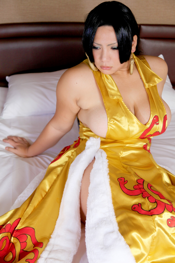 asian bed black_hair breasts chouzuki_maryou cleavage cosplay earrings female huge_breasts long_hair solo