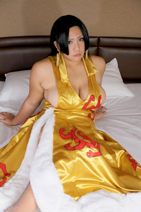 asian bed black_hair breasts chouzuki_maryou cleavage cosplay earrings female huge_breasts long_hair solo