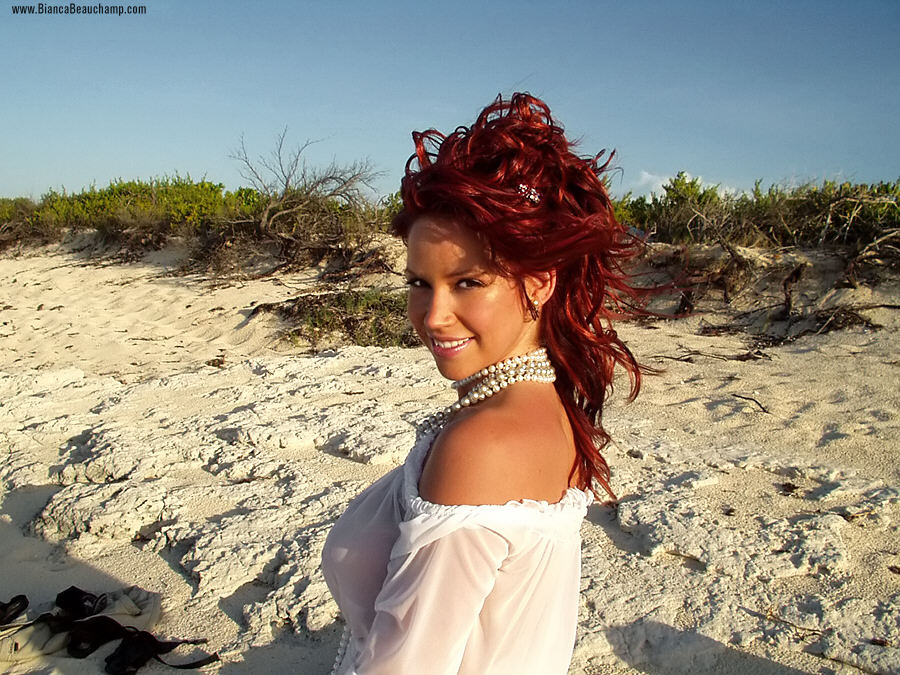 bianca_beauchamp breasts female large_breasts long_hair red_hair solo watermark