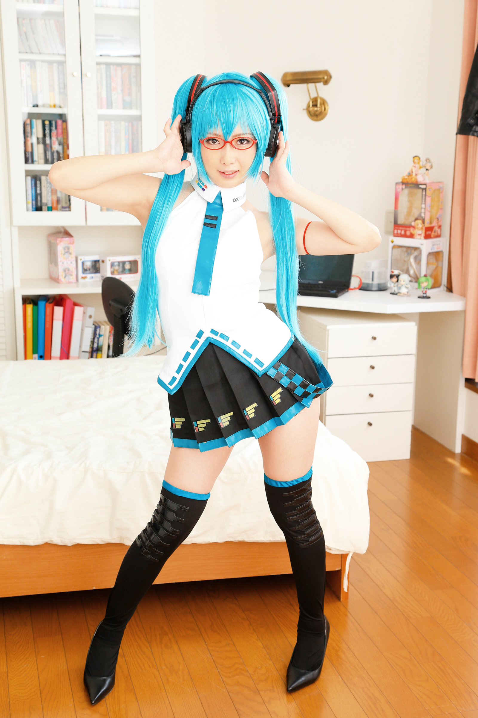 asian blue_hair cosplay female glasses headphones high_heels long_hair necktie shoes skirt socks solo