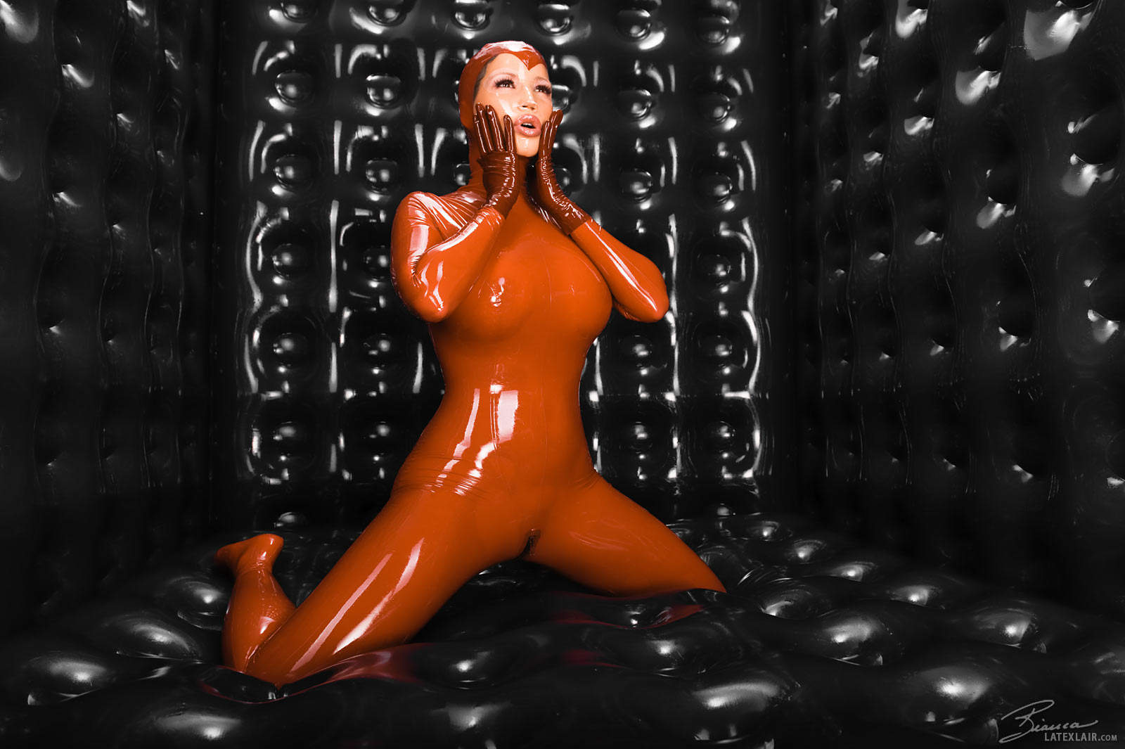 bianca_beauchamp breasts catsuit female gloves large_breasts latex long_hair red_hair solo watermark