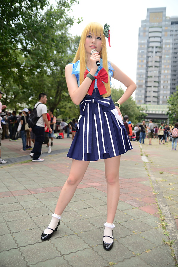 asian blonde_hair breasts cosplay female high_heels long_hair microphone ribbon shoes skirt socks solo