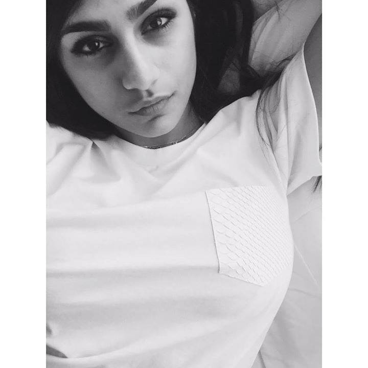 1:1_aspect_ratio 1girl breasts brown_eyes brown_hair clothed female female_only greyscale lebanese_american looking_at_viewer mia_khalifa monochrome non-nude porn_star solo tan_skin