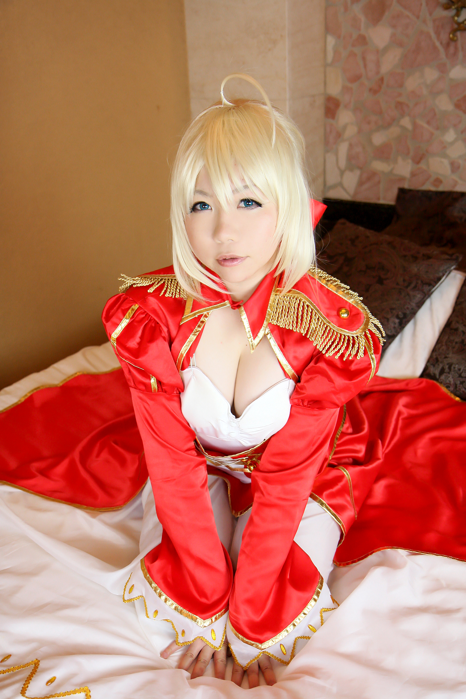 asian bed blonde_hair boots breasts cleavage cosplay dress female high_heels long_hair solo