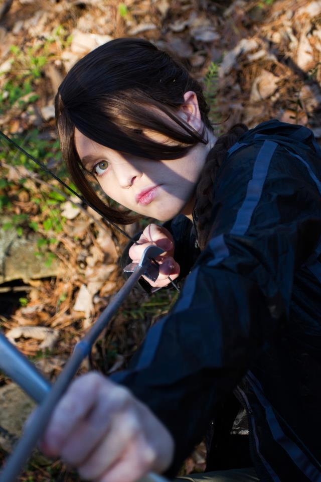 arrow_(object) black_hair breasts cosplay female foxycosplay katniss_everdeen long_hair solo tagme the_hunger_games