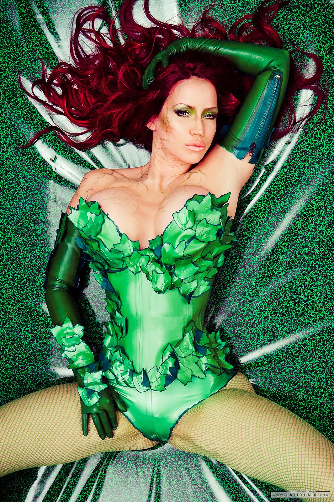 bianca_beauchamp boots breasts cleavage elbow_gloves female fishnets gloves high_heels large_breasts leotard long_hair red_hair solo watermark