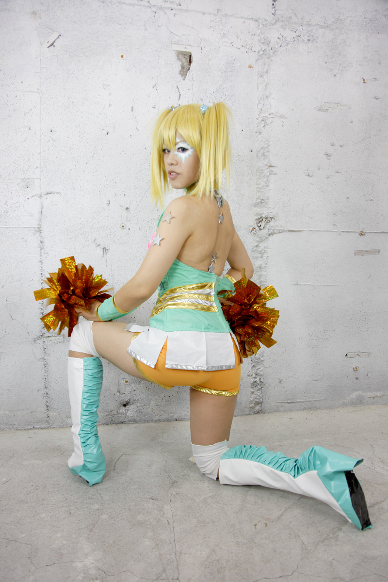 blonde_hair boots breasts female high_heels long_hair pigtails pom_poms skirt solo tank_top