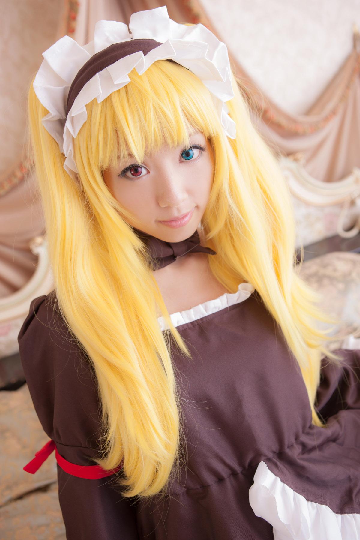 asian blonde_hair breasts cosplay dress female high_heels large_breasts long_hair shoes solo thighhighs twintails