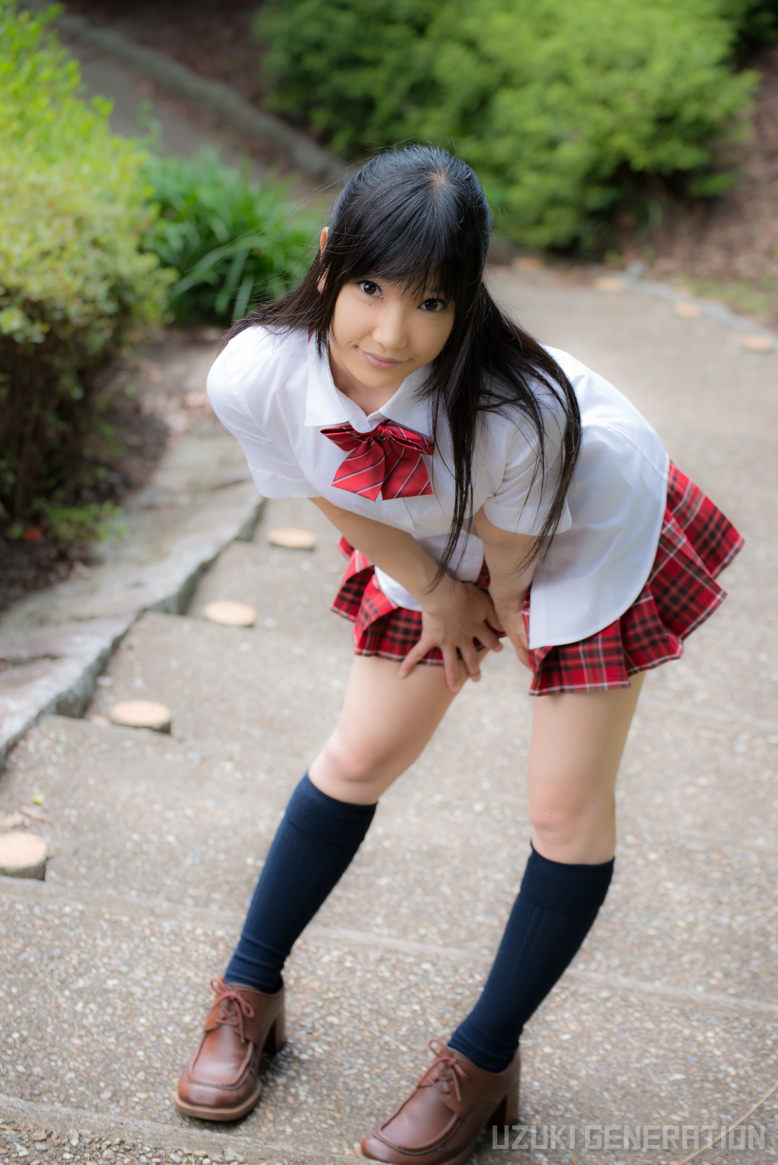 1girl asian black_hair clothed cute female female_only kneehighs lenfried long_hair looking_at_viewer necktie non-nude plaid_skirt posing smile solo tan_skin watermark