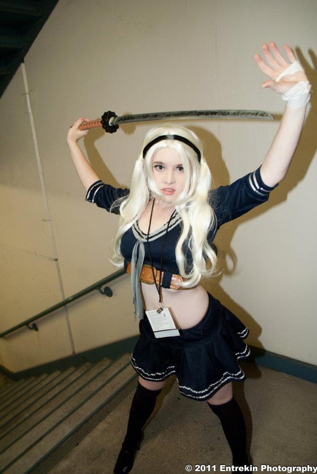 1girl 2011 blonde_hair breasts cosplay female foxycosplay long_hair skirt solo stairs sucker_punch sword tagme
