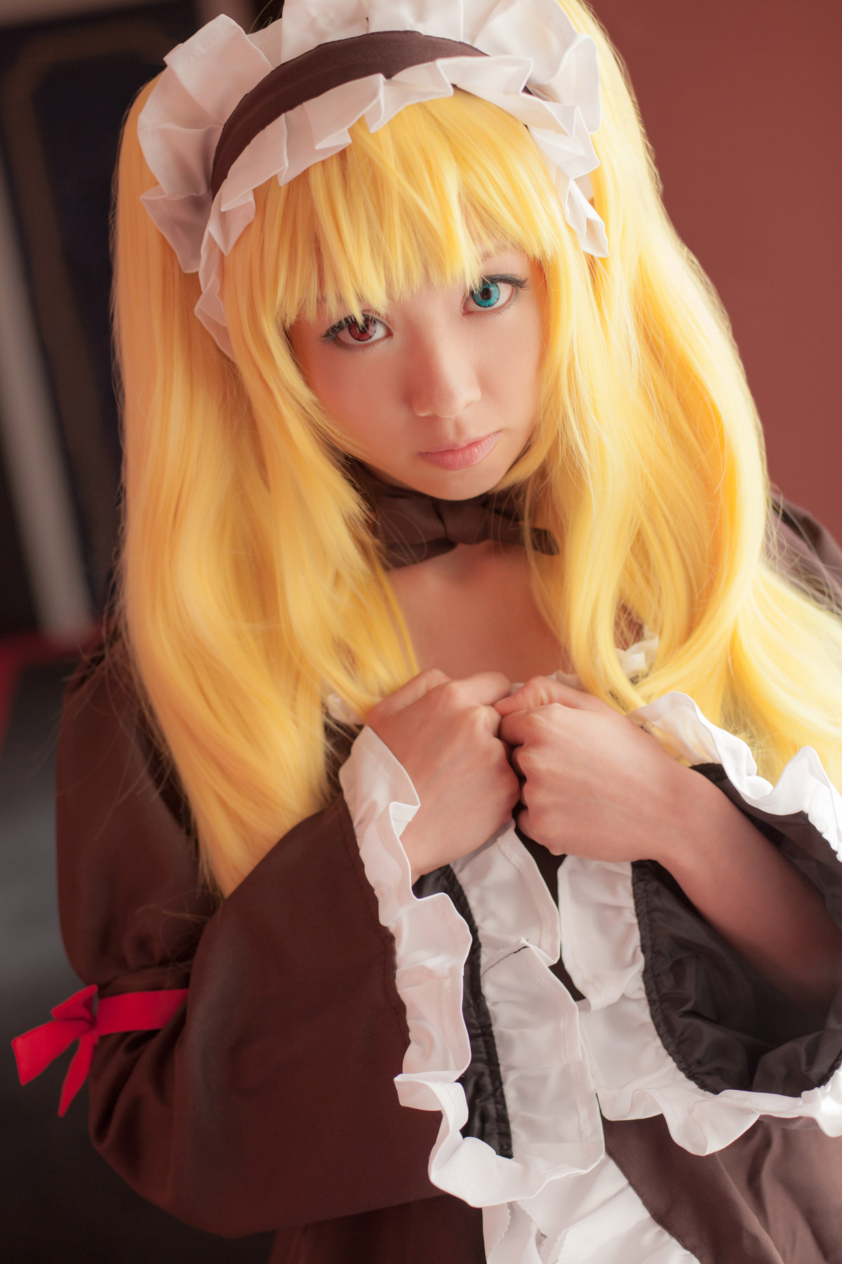 asian blonde_hair breasts cosplay dress female high_heels large_breasts long_hair shoes solo thighhighs twintails