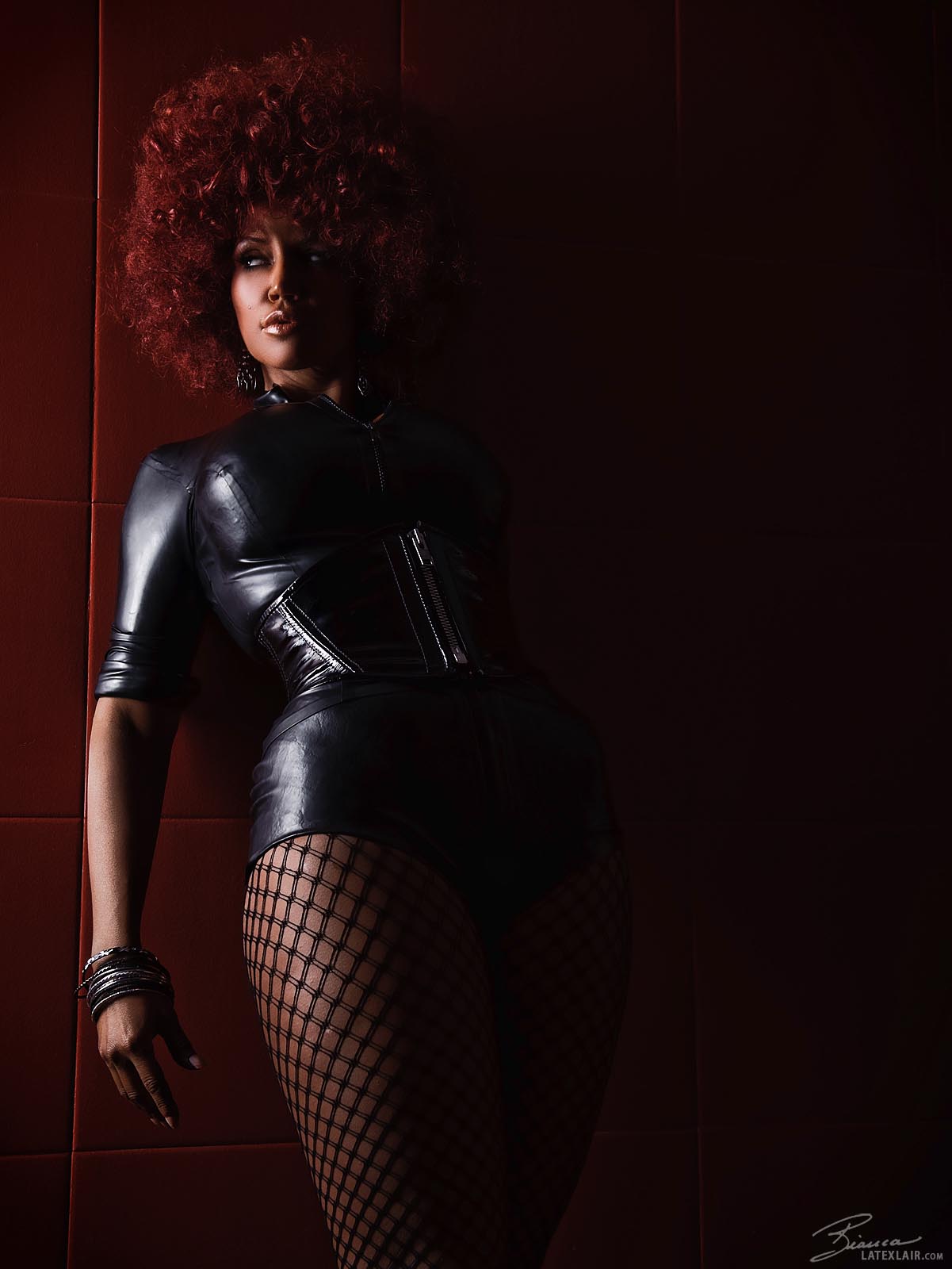 bianca_beauchamp breasts corset earrings female fishnets large_breasts latex long_hair red_hair solo watermark