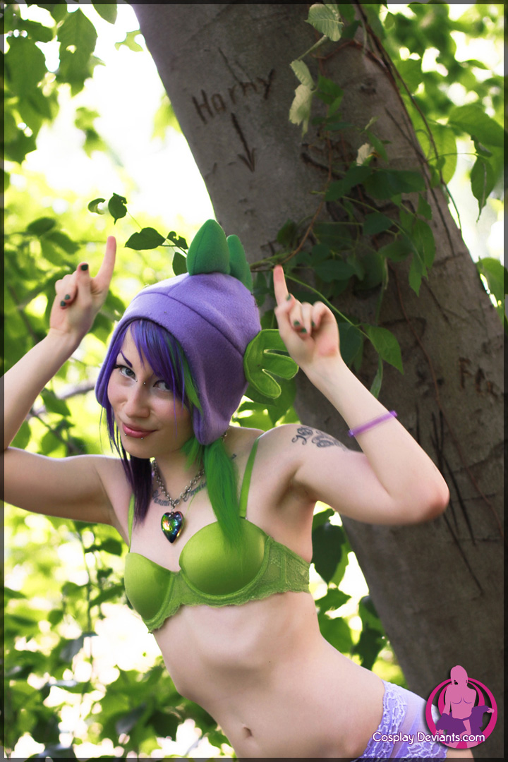 breasts chuck_taylors cosplay cosplaydeviants female long_hair outside porphyria purple_hair shoes solo tattoo watermark