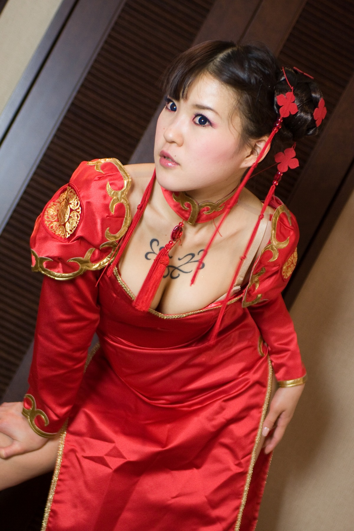 asian breasts brown_hair cosplay earrings female long_hair makeup solo
