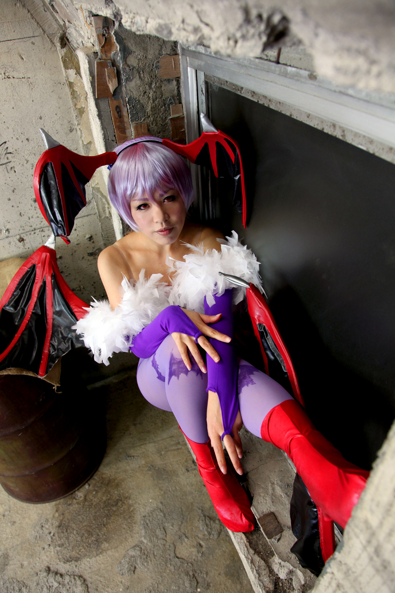 1girl bare_shoulders capcom clothed cosplay darkstalkers female female_only huge_breasts lilith_aensland long_hair looking_at_viewer non-nude purple_hair solo succubus suzuka_itsuki watermark wings