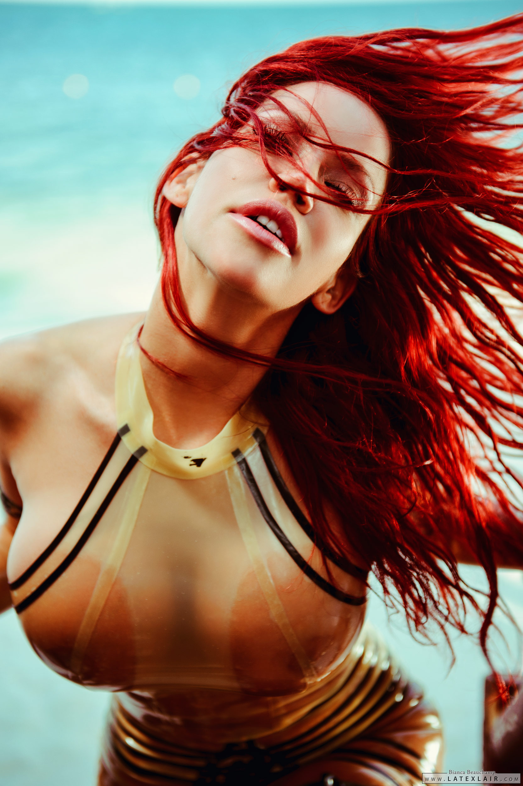bianca_beauchamp breasts elbow_gloves erect_nipples female gloves high_heels large_breasts latex long_hair nipples outside red_hair sand see-through shoes solo stairs watermark