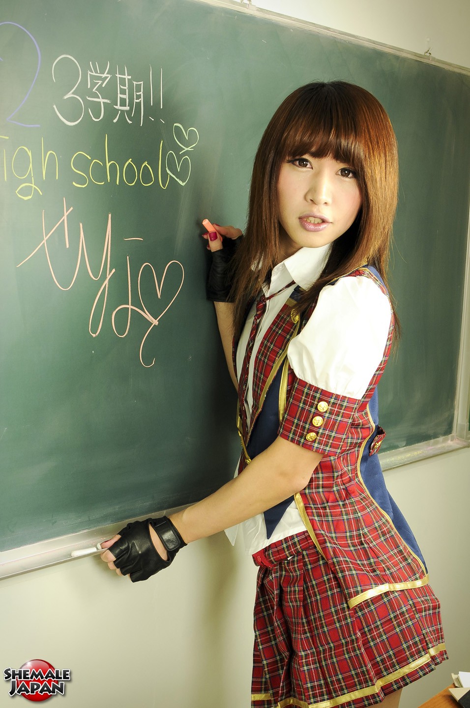 asian brown_hair clothed fingerless_gloves long_hair looking_at_viewer nail_polish necktie non-nude parted_lips plaid_skirt schoolgirl shemale shemale_japan solo tachibana_serina transgender watermark