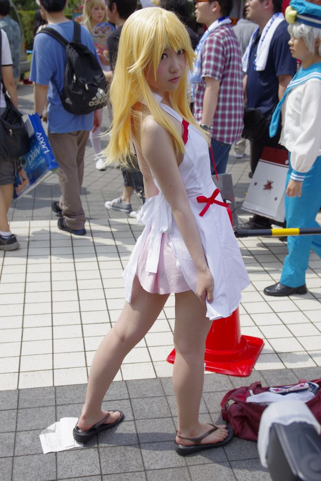 asian ass blonde_hair breasts cosplay long_hair looking_back monogatari_(series) oshino_shinobu outside