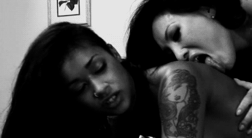 2girls arms asa_akira babe bare_shoulders black_hair bracelet breast_grab breast_press breasts breath cheek_kiss closed_eyes dark_skin eyeshadow female female_only from_behind gif girl_on_top hug_from_behind hugging jewelry kissing lesbian licking lips long_hair lying moaning monochrome multiple_girls necklace nipples nude on_stomach open_mouth photo pornstar real_person sex sideboob skin_diamond tattoo teeth tongue tongue_out topless