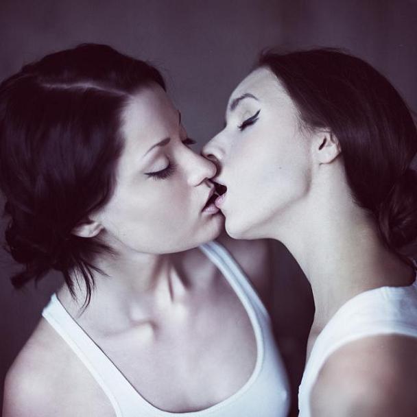 2girls bare_shoulders black_hair camisole closed_eyes collarbone eyeshadow female hair hair_up kiss kissing lesbian lips love makeup multiple_girls neck open_mouth photo short_hair tank_top