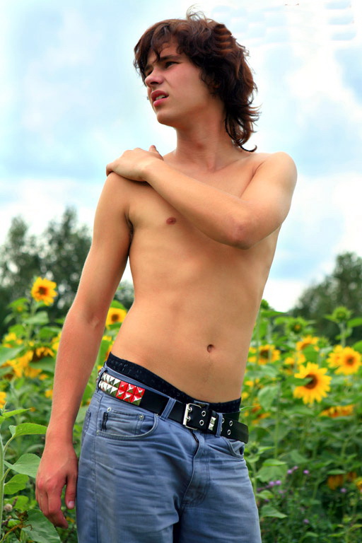 belt brown_hair jeans looking_back male male_only outside photo public teen topless