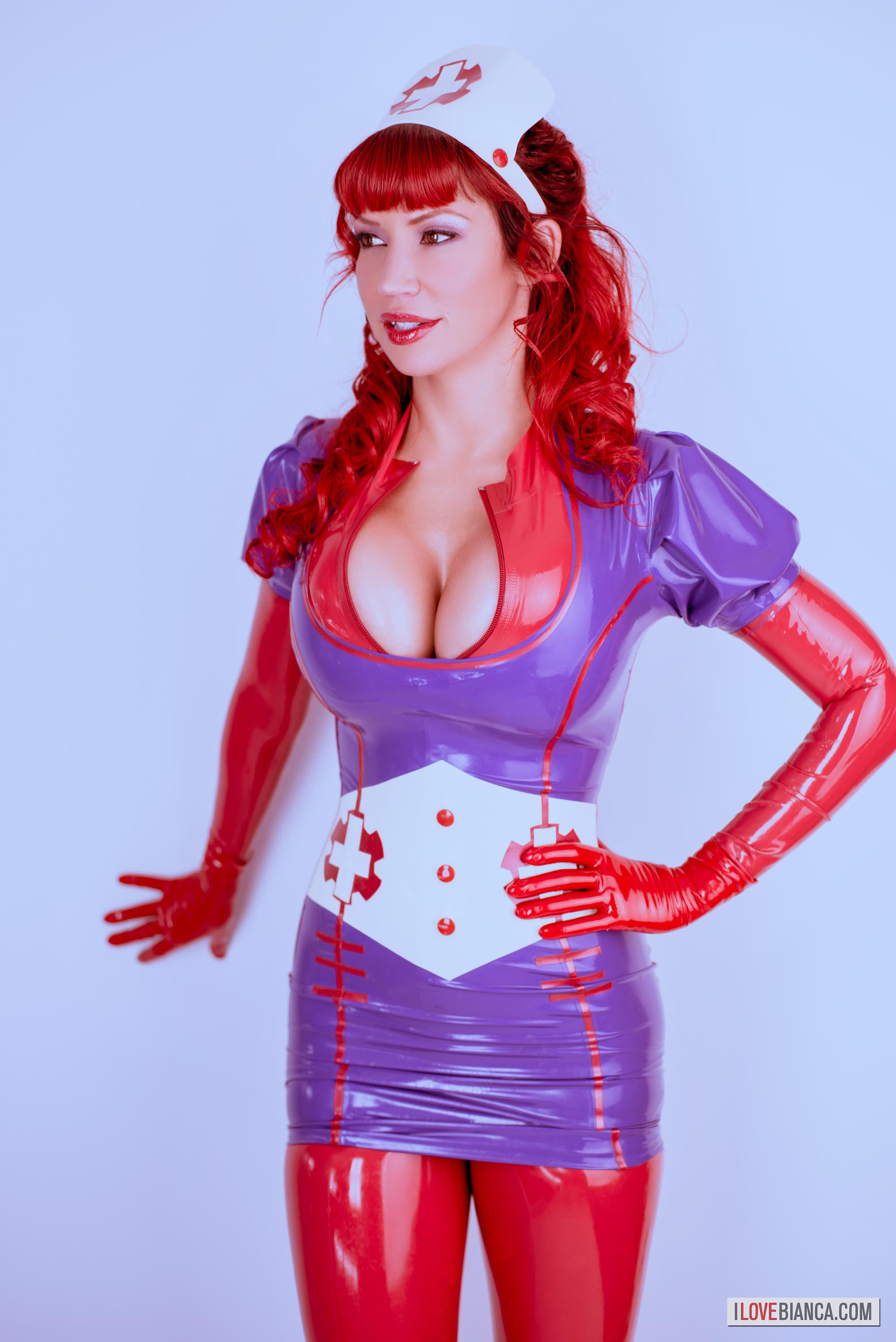 bianca_beauchamp breasts dress female high_heels large_breasts latex lipstick long_hair nurse red_hair shoes solo thighhighs watermark