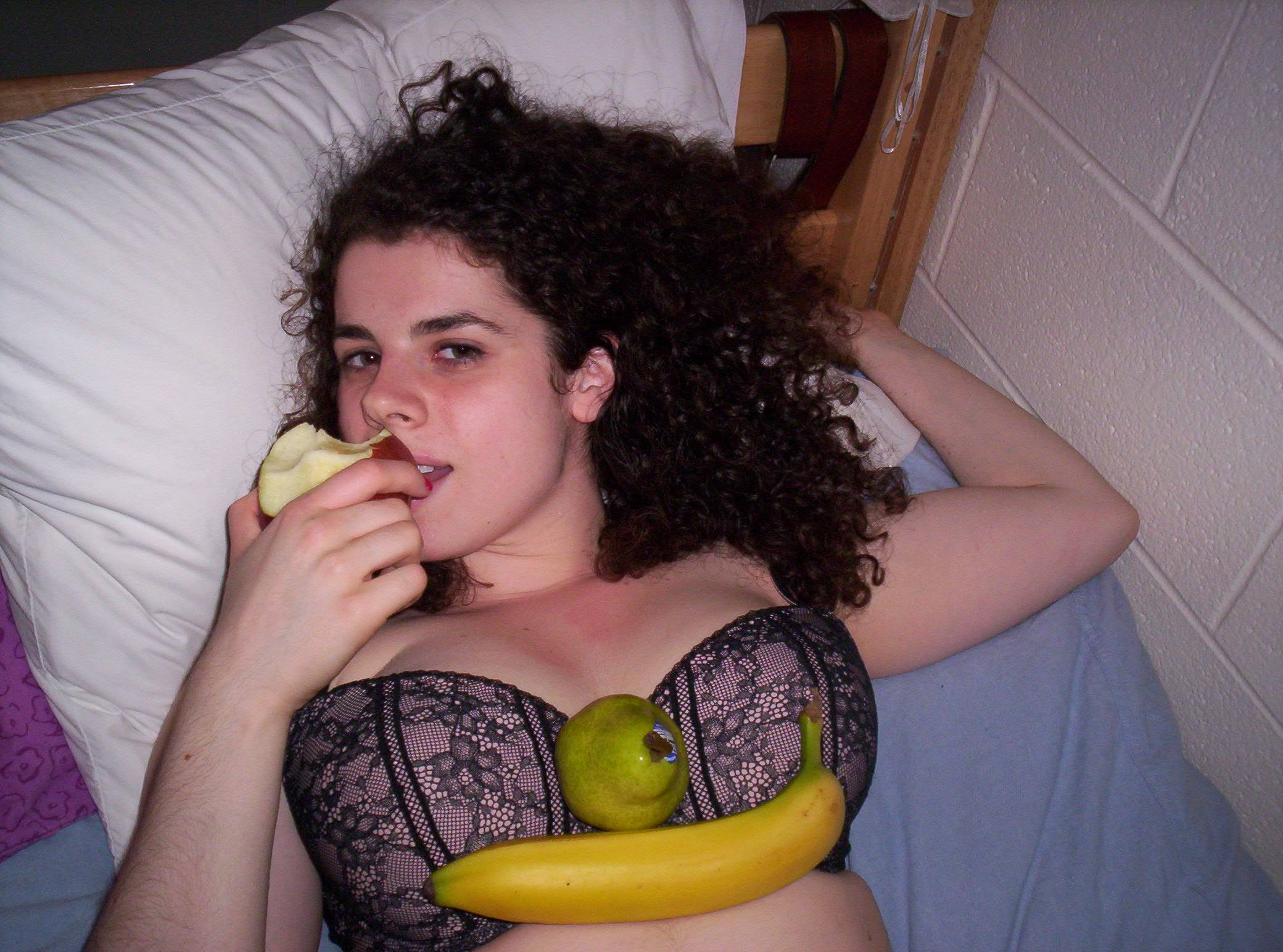 bed bra breasts female food fruit highres long_hair lying solo