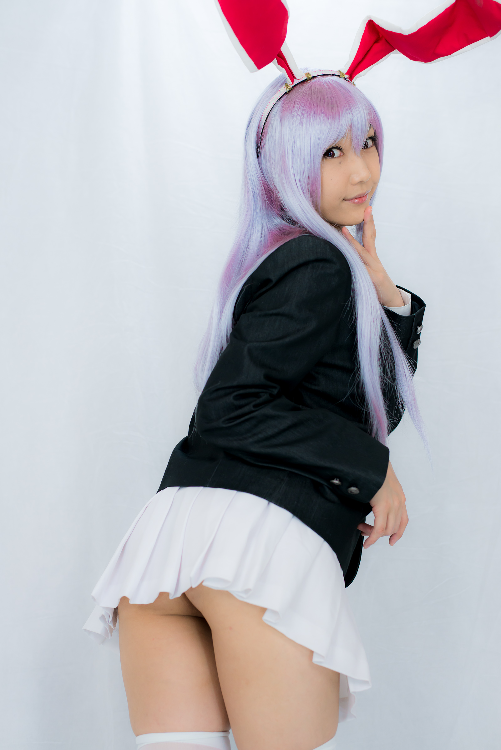 animal_ears asian ass breasts female finger_to_mouth high_heels lenfried long_hair looking_back necktie purple_hair shoes simple_background skirt socks solo watermark