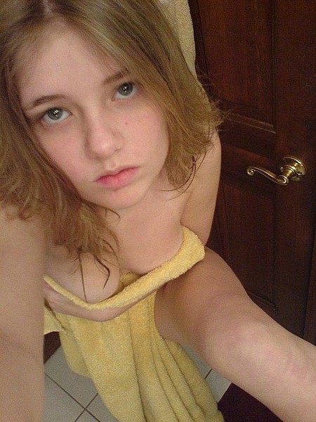 1girl amateur brown_hair cleavage from_above perspective self_shot selfie solo towel