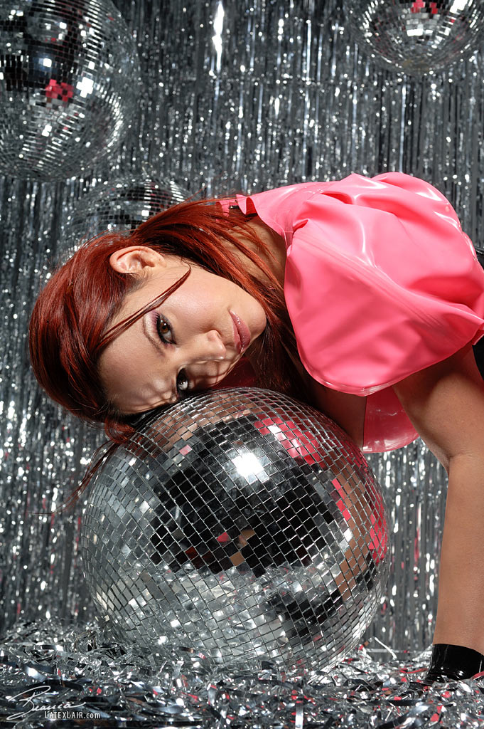 bianca_beauchamp breasts disco_ball dress female gloves large_breasts latex long_hair red_hair solo