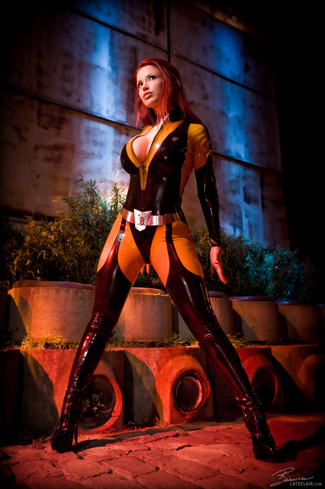 bianca_beauchamp breasts female large_breasts latex long_hair red_hair solo watermark