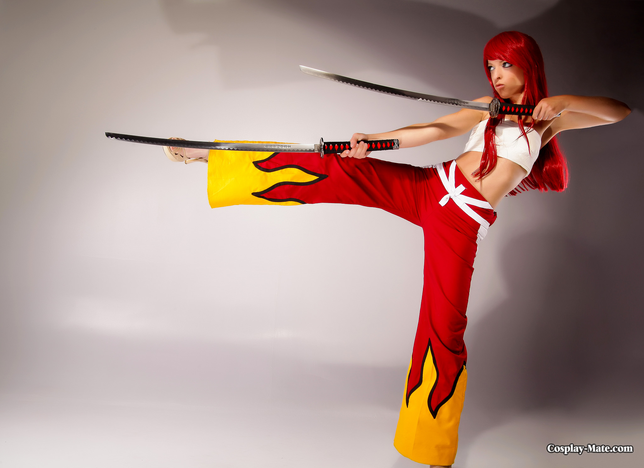 cosplay cosplay-mate erza_scarlet erza_scarlet_(cosplay) fairy_tail kick red_hair sword weapon