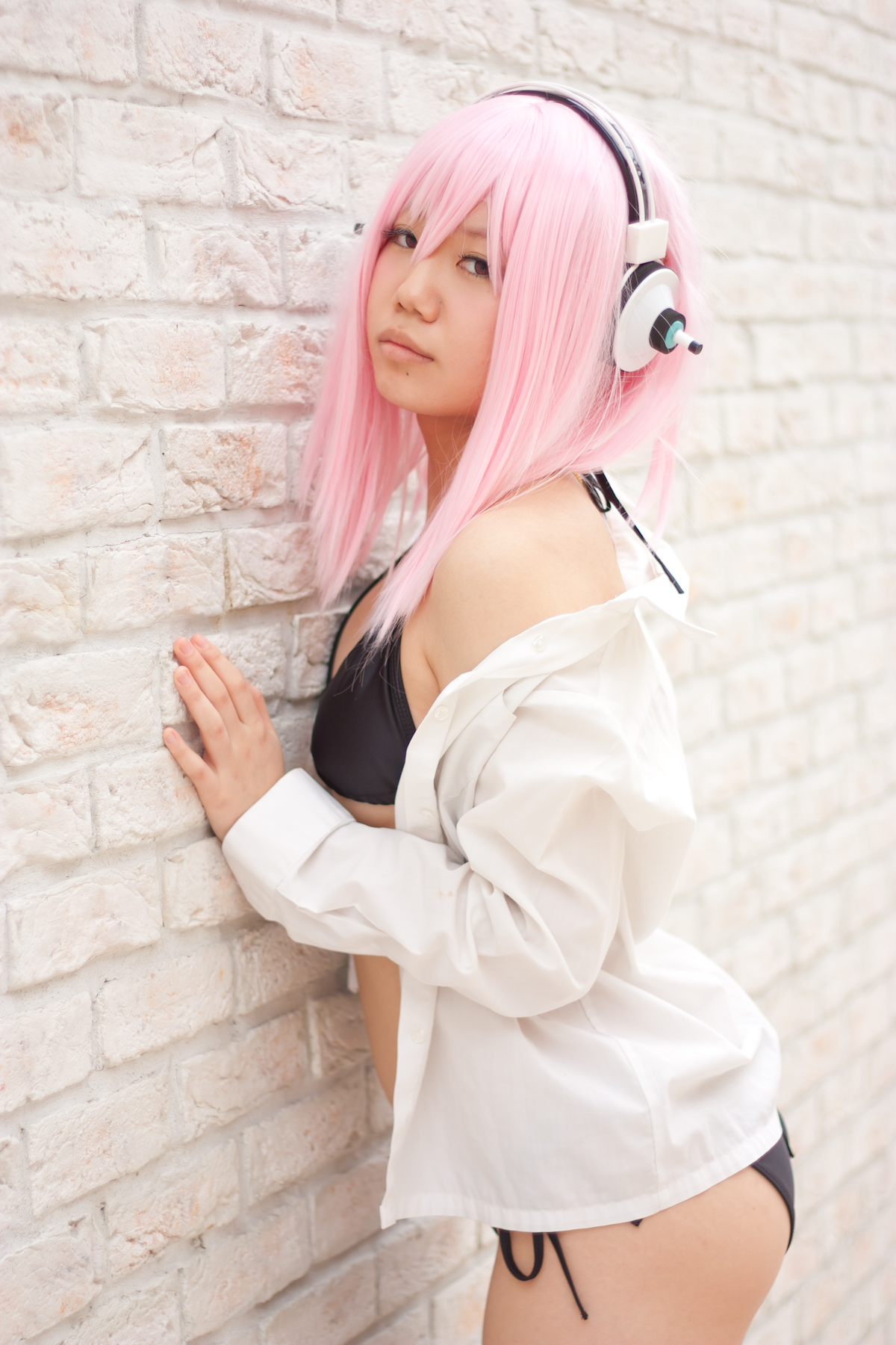 asian bikini breasts cosplay female headphones long_hair pink_hair solo
