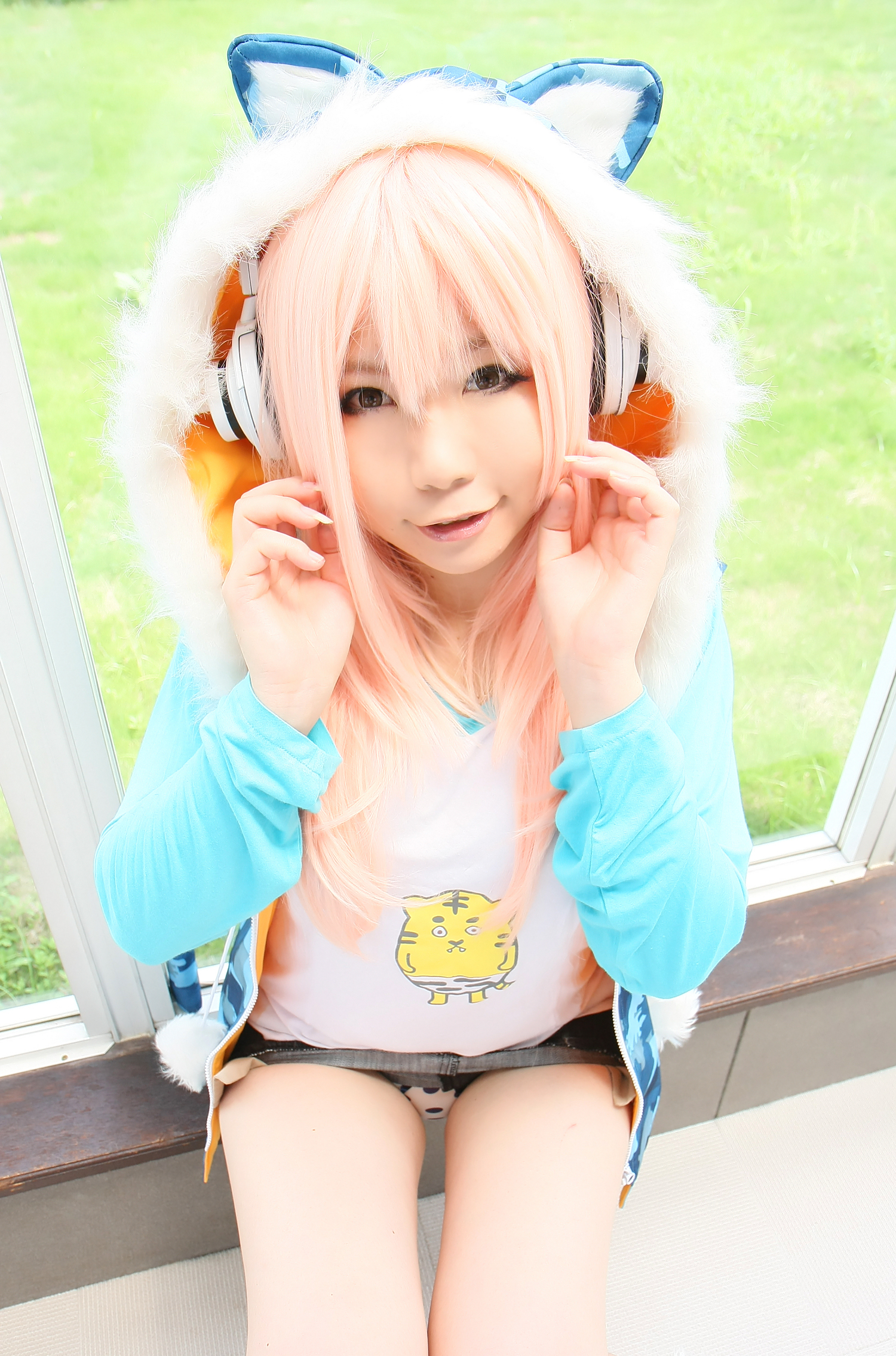 asian breasts cosplay female headphones large_breasts long_hair pink_hair solo super_sonico