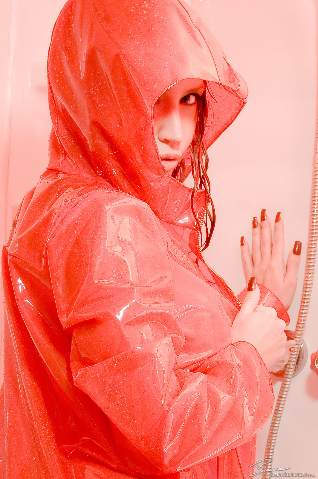 bianca_beauchamp breasts cleavage female large_breasts latex long_hair mirror nail_polish raincoat red_hair shower solo watermark wet