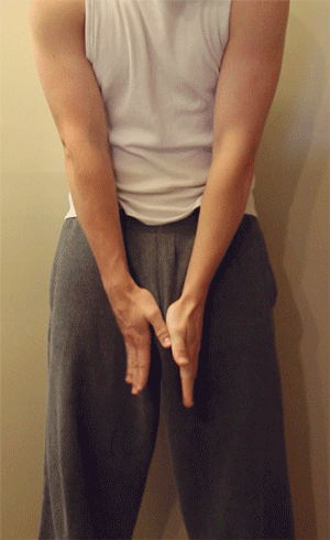 animated bulge gay gif male_only muscle pants penis presenting